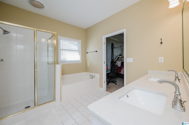 bathroom featuring tile patterned flooring, vanity, and plus walk in shower