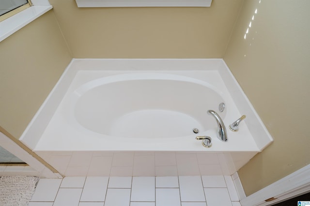 bathroom with tiled tub