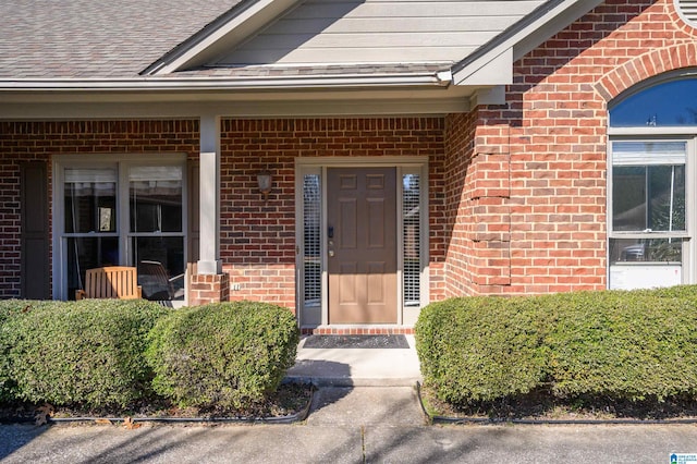 property entrance with covered porch