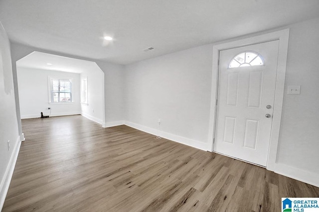 foyer entrance with hardwood / wood-style floors