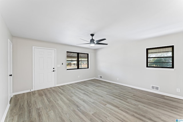 unfurnished room featuring ceiling fan and light hardwood / wood-style flooring