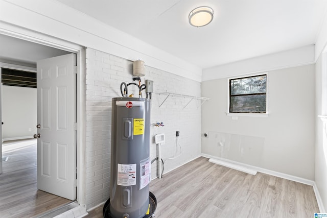 utility room with electric water heater