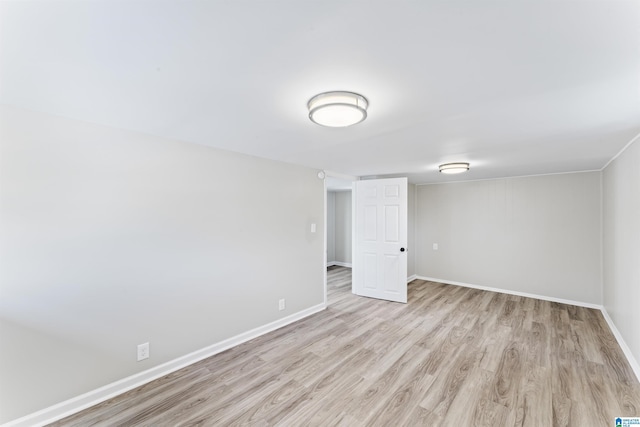 unfurnished room featuring light wood-type flooring