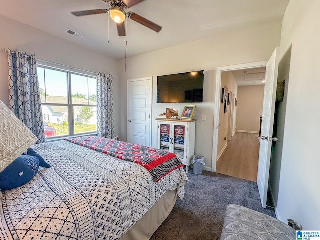 carpeted bedroom featuring ceiling fan