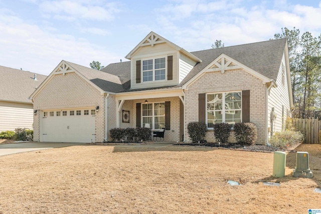 view of front of home with a garage and covered porch