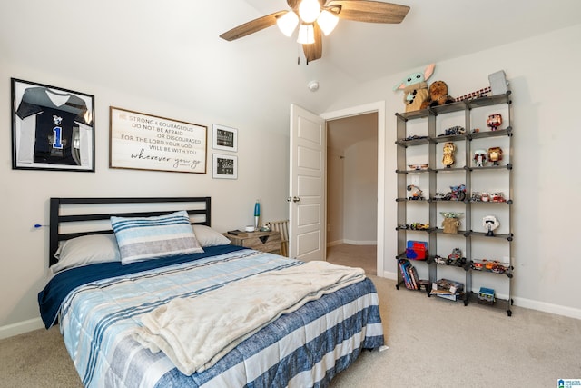 bedroom featuring light carpet, lofted ceiling, and ceiling fan