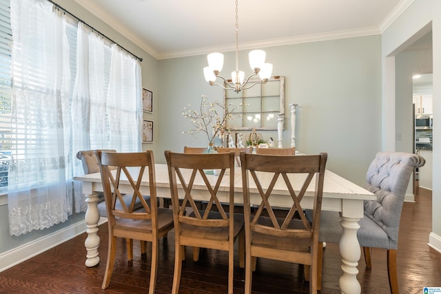 dining space featuring a notable chandelier, crown molding, and dark wood-type flooring