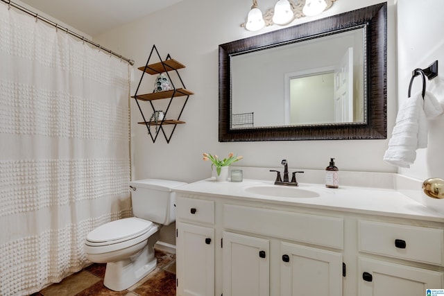 bathroom with tile patterned flooring, vanity, a shower with curtain, and toilet