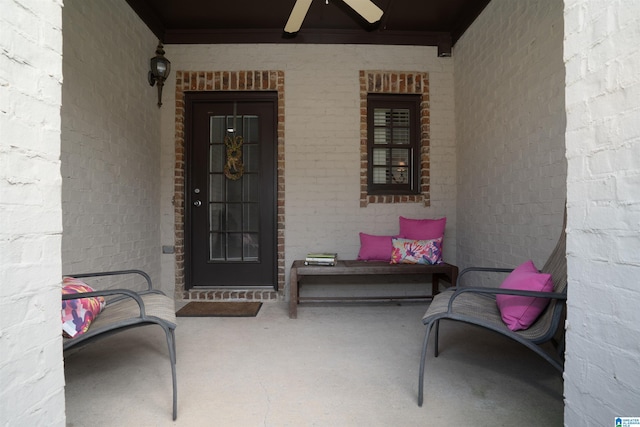 doorway to property featuring ceiling fan