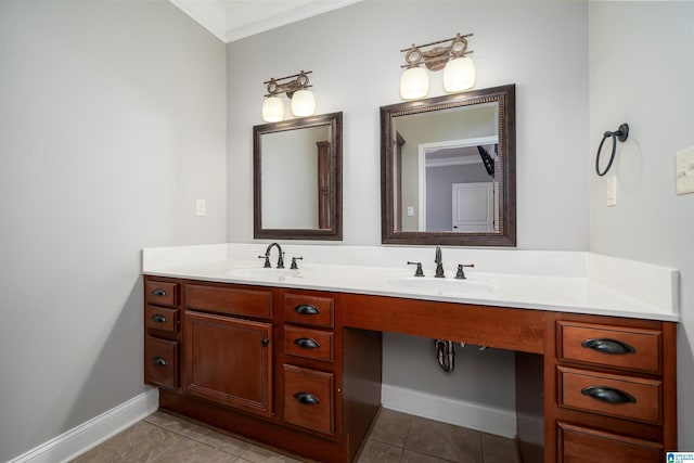 bathroom with vanity and ornamental molding