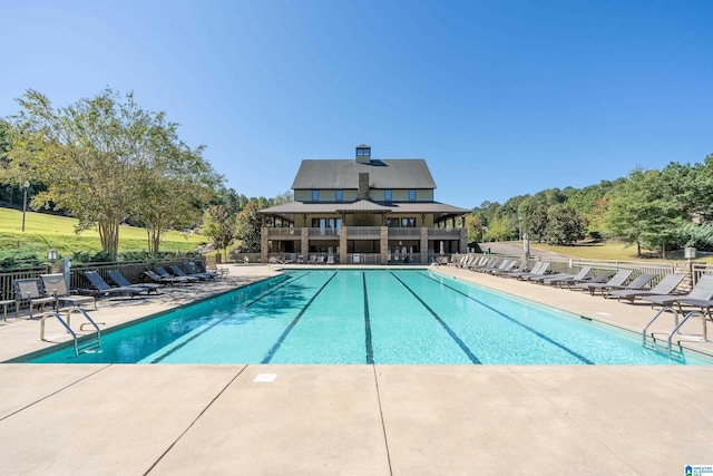 view of pool featuring a patio