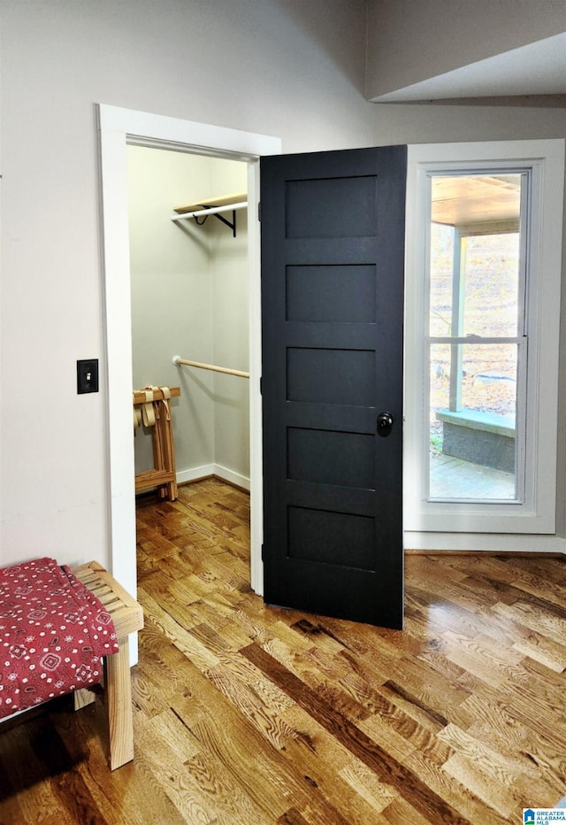 interior space with hardwood / wood-style flooring