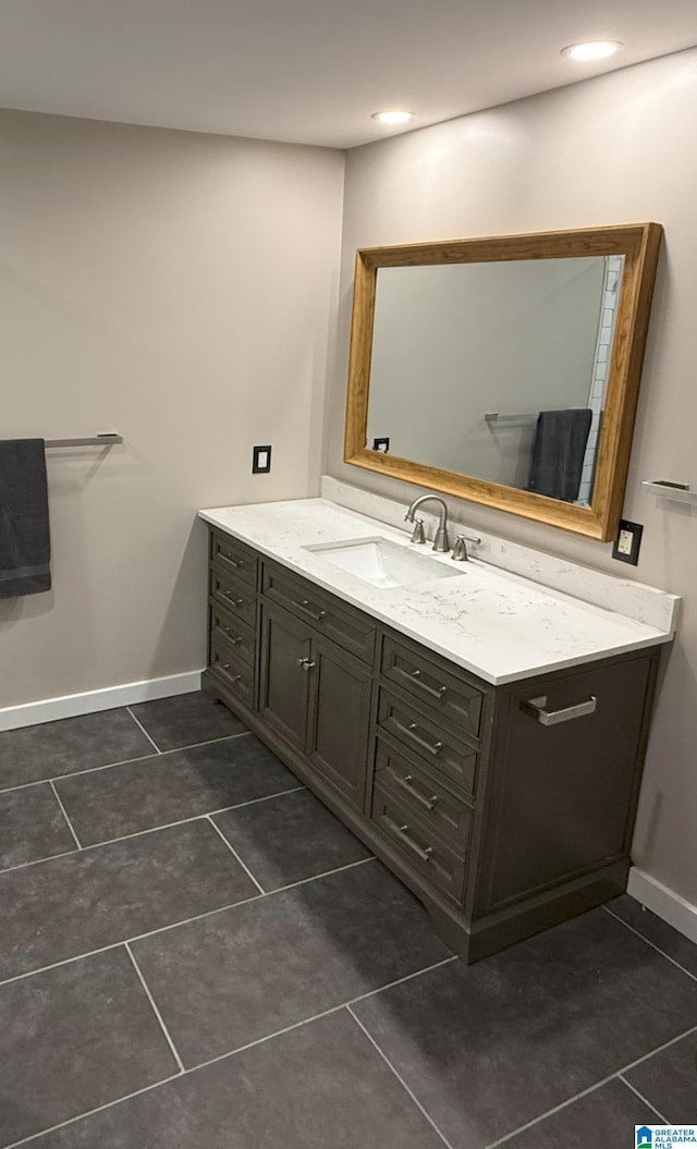 bathroom featuring vanity and tile patterned flooring