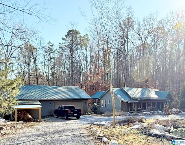 ranch-style house featuring a garage