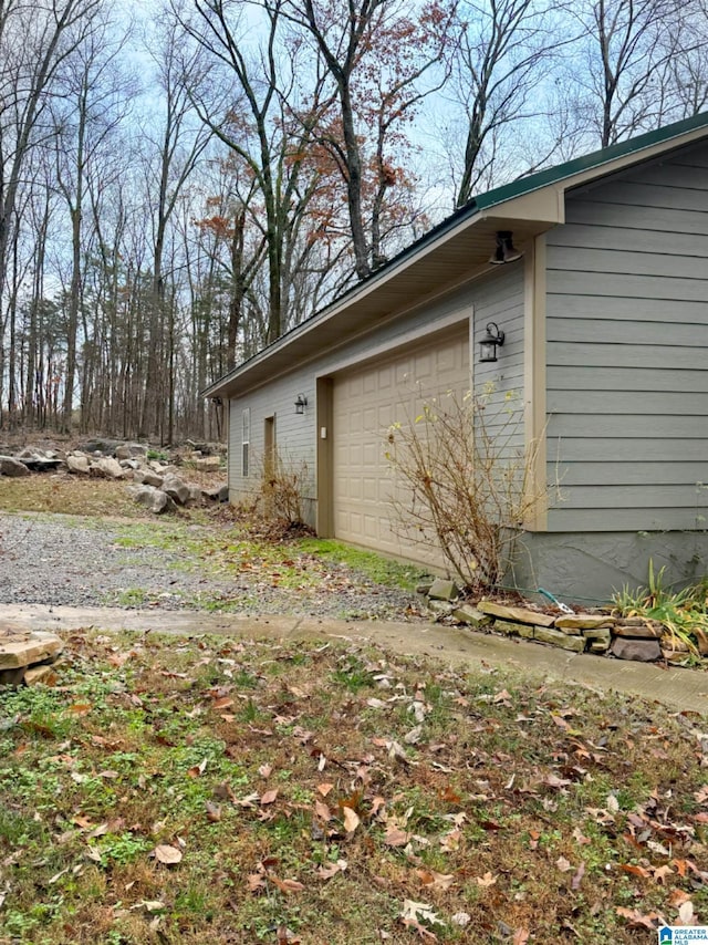 view of home's exterior with a garage