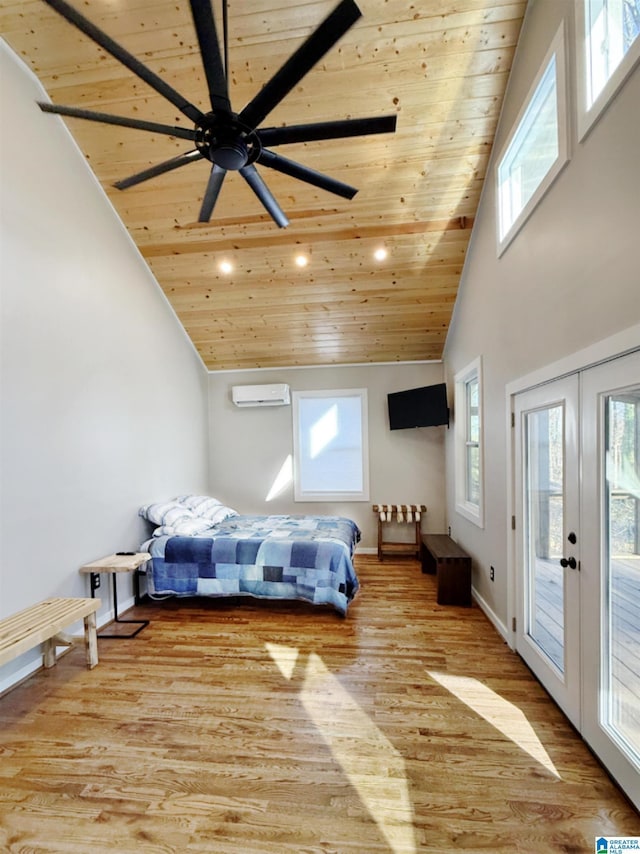 bedroom with wood ceiling, light hardwood / wood-style flooring, a wall mounted AC, access to outside, and french doors