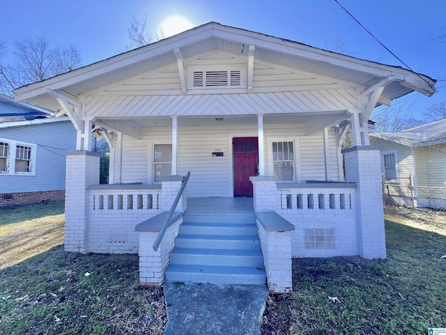 bungalow featuring covered porch