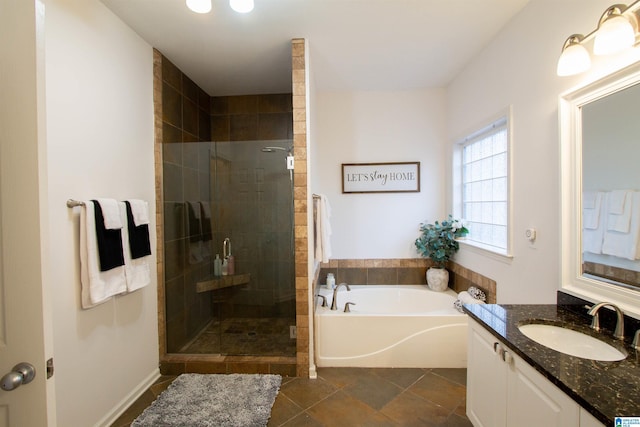 bathroom with plus walk in shower and vanity