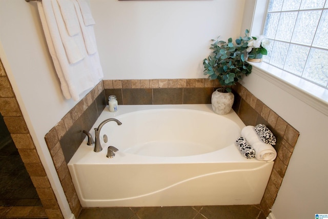 bathroom with a washtub