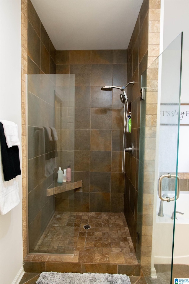 bathroom featuring walk in shower