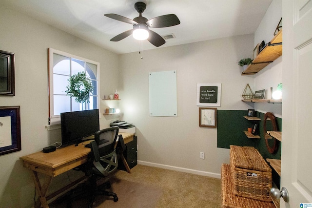 carpeted office with ceiling fan