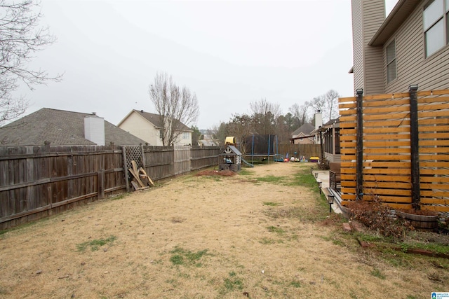 view of yard featuring a trampoline