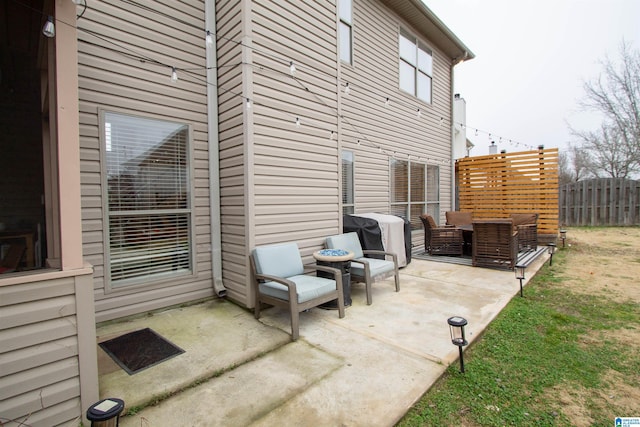 view of patio / terrace with an outdoor living space and grilling area