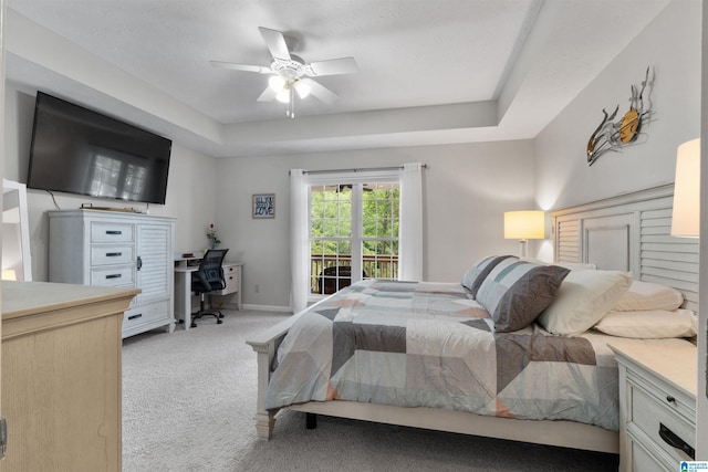373 Pineywoods Dr, Wedowee, AL 36278 - bedroom with a raised ceiling, access to outside, light carpet, and ceiling fan
