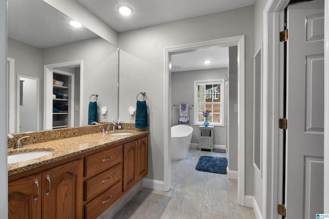 373 Pineywoods Dr, Wedowee, AL 36278 - bathroom with vanity and a bathtub