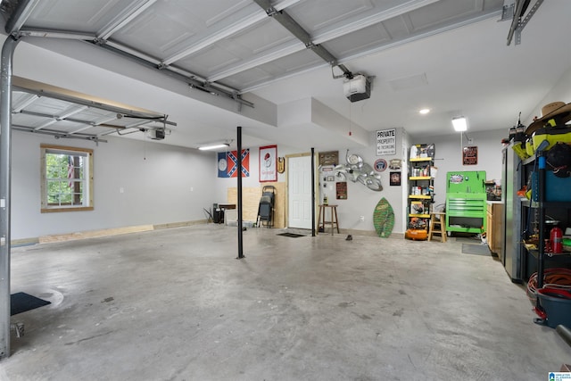 373 Pineywoods Dr, Wedowee, AL 36278 - garage featuring a garage door opener