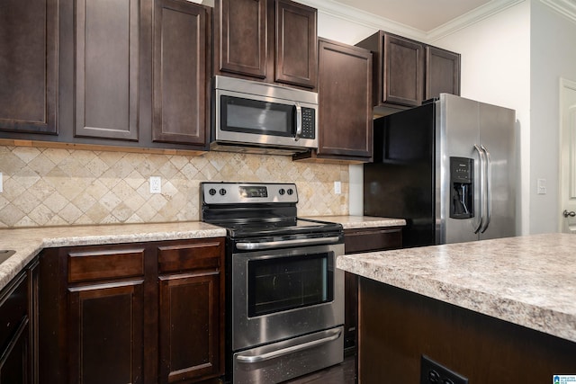 kitchen featuring stainless steel appliances, ornamental molding, tasteful backsplash, and dark brown cabinetry