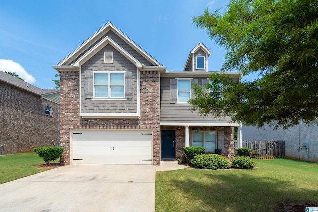 craftsman-style house with a garage and a front lawn