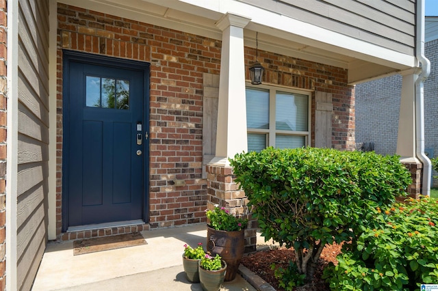 entrance to property with covered porch