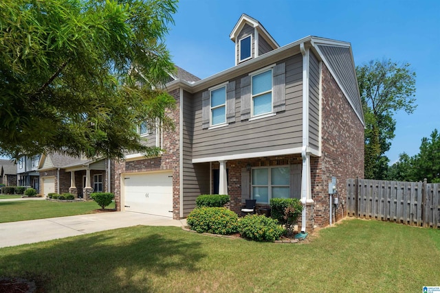 view of front of property featuring a garage and a front yard