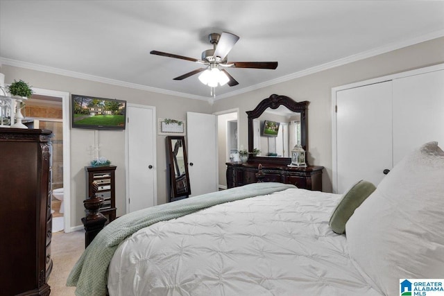 carpeted bedroom featuring ornamental molding and ceiling fan