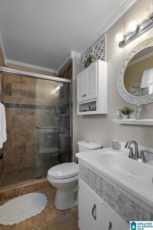 bathroom featuring ornamental molding, toilet, an enclosed shower, and vanity