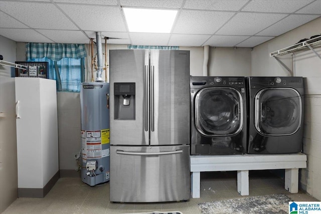 laundry room featuring gas water heater and washing machine and dryer