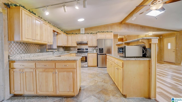 kitchen with sink, vaulted ceiling with beams, tasteful backsplash, light brown cabinets, and stainless steel appliances