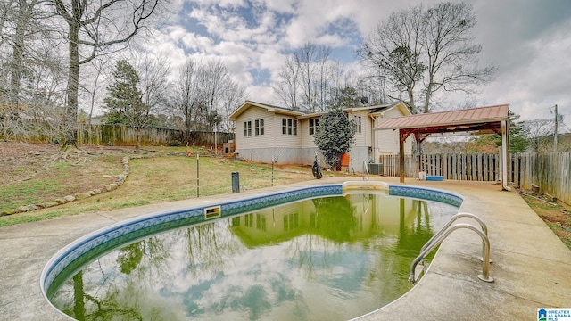 view of swimming pool featuring a gazebo