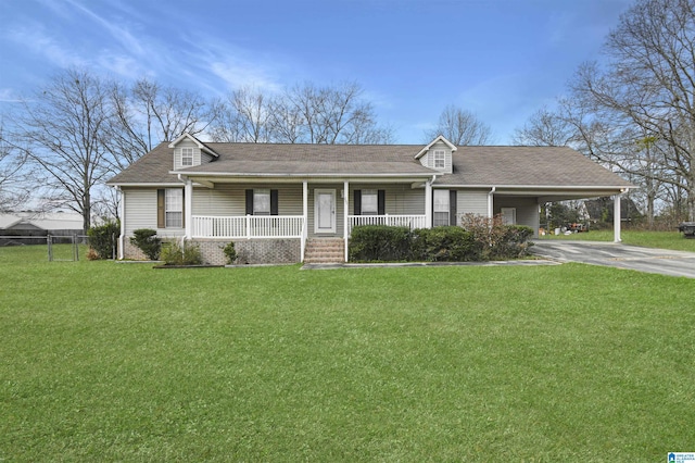 ranch-style home with a front yard, a carport, and a porch