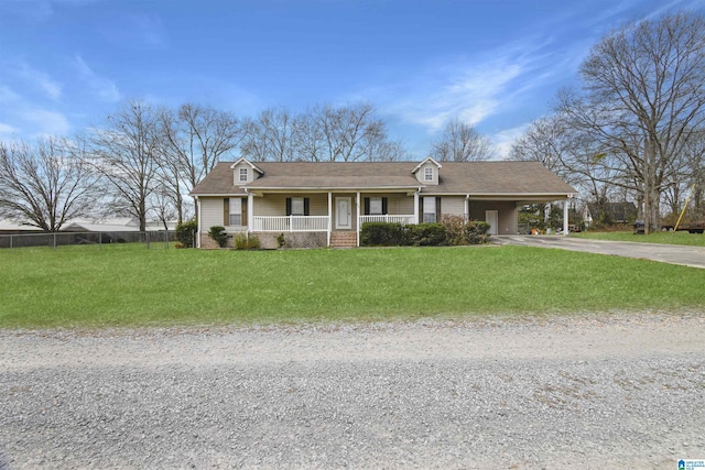 ranch-style home with a porch, a carport, and a front yard