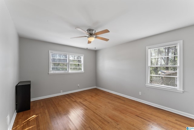 unfurnished room featuring wood-type flooring and ceiling fan