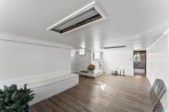 interior space with a wealth of natural light and wood-type flooring