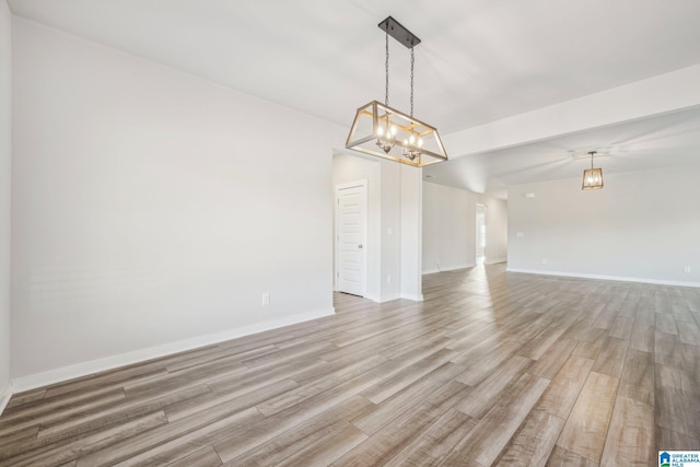 unfurnished room featuring light hardwood / wood-style flooring