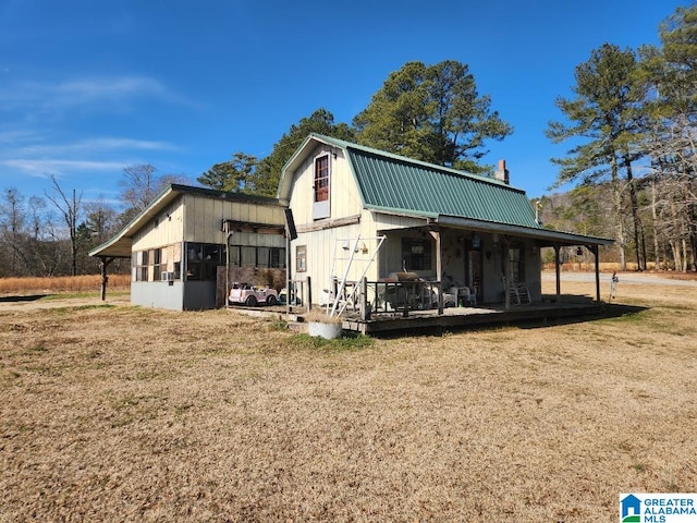 view of outdoor structure with a lawn