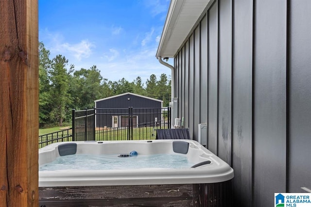 deck featuring a hot tub