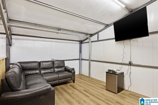 living room with light hardwood / wood-style flooring