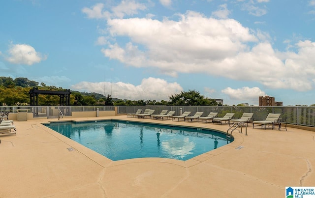 view of pool featuring a patio area