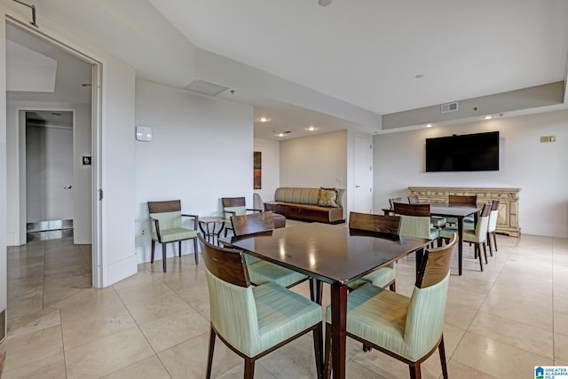 dining room with light tile patterned flooring