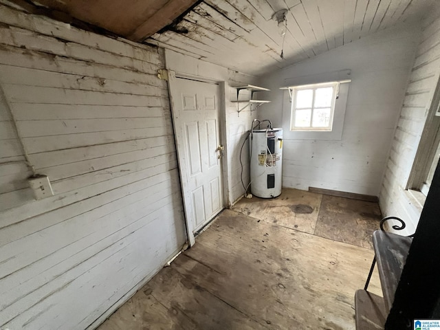 basement with wooden ceiling and water heater